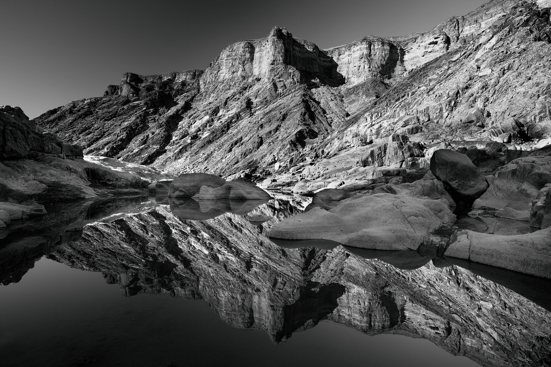 Fine Art Black-and-White Landscape Photograph from the bottom of the Fish River Canyon during a 87km hike f the Fish River Canyon hiking Trail in Namibia, Southern Africa